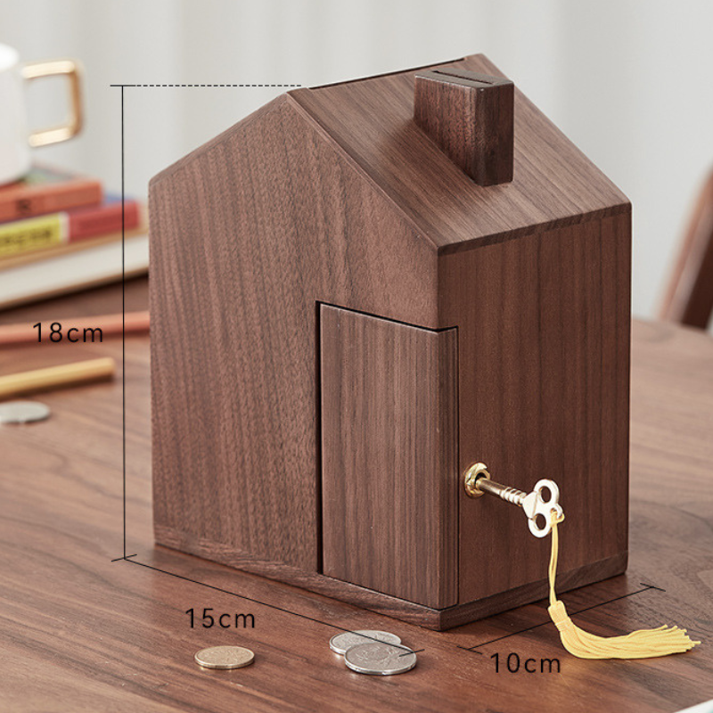 Wooden house shaped piggy bank