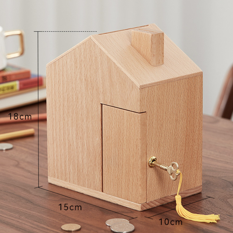 Wooden house shaped piggy bank