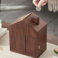 Wooden house shaped piggy bank